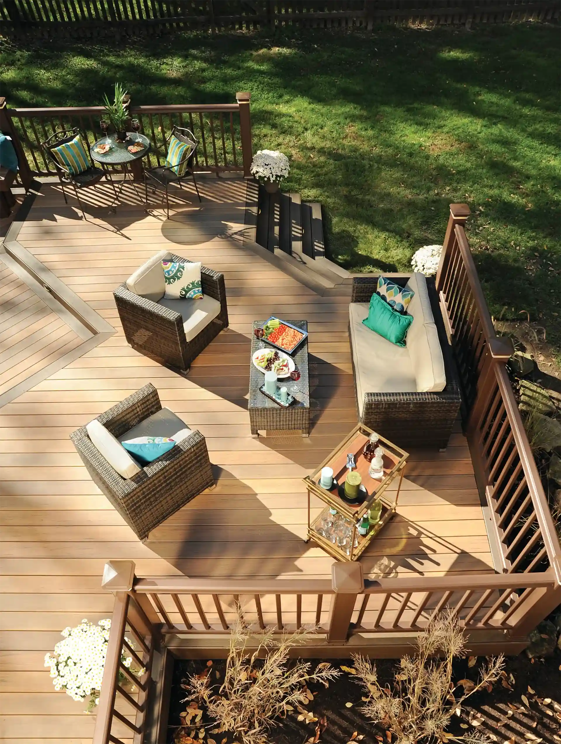 custom deck with outdoor furniture and deck steps - Custom Deck Builders and Outdoor Living Contractors in Fitchburg, Wisconsin