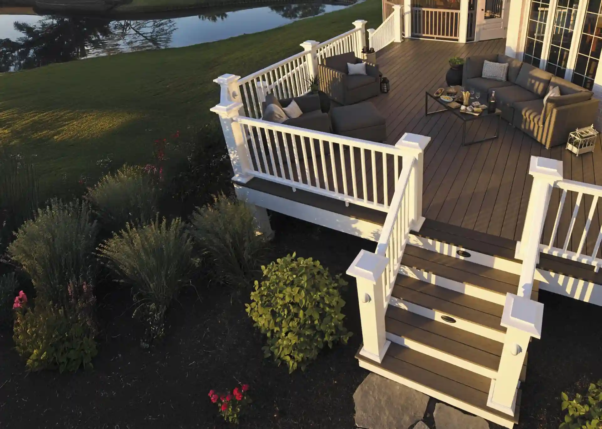 photo of an AZEK deck with white railing and deck steps - Azek Decks - Composite Decking Company near me in dane county WI