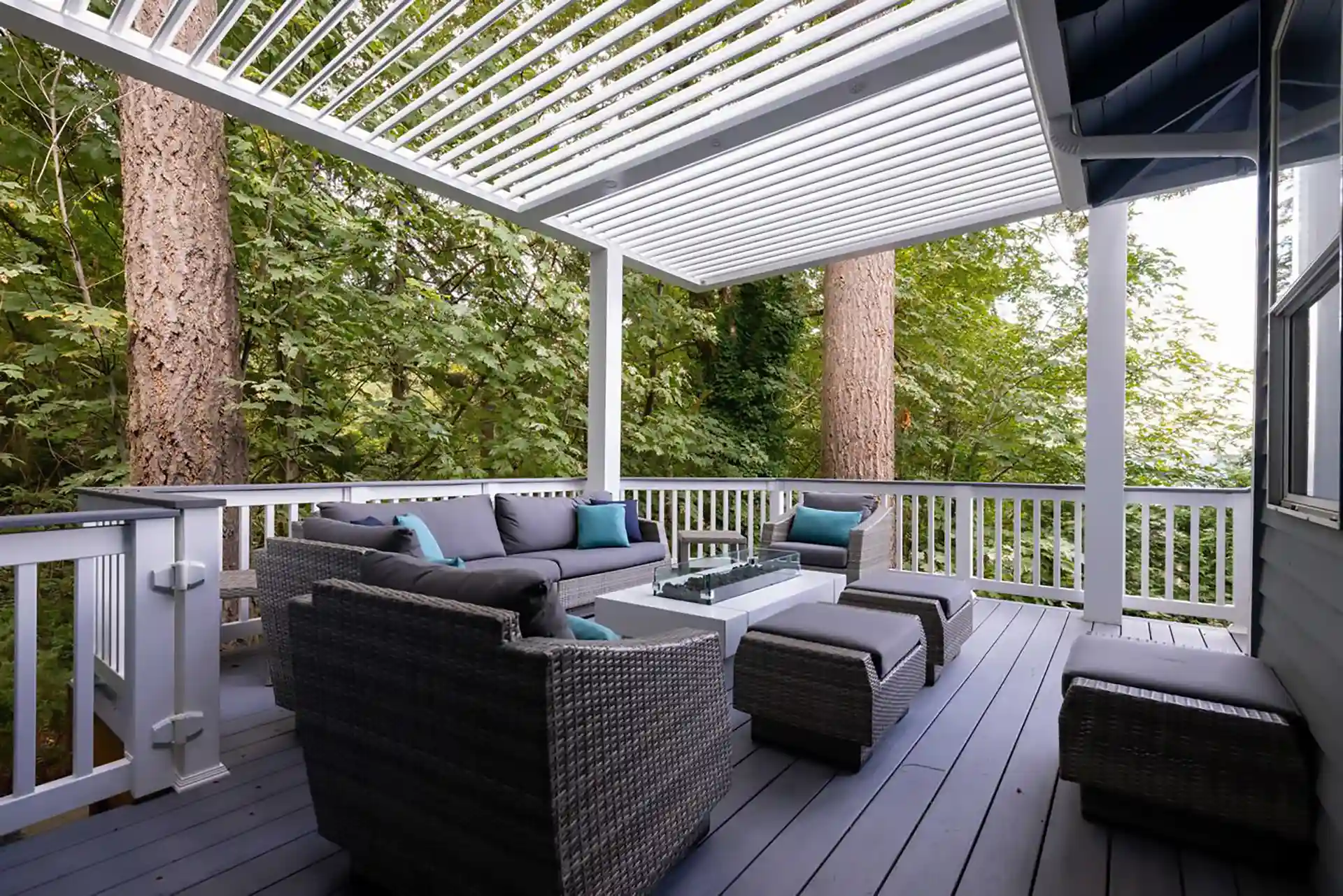 Photo of a louvered roof pergola to help keep a deck cool in summer