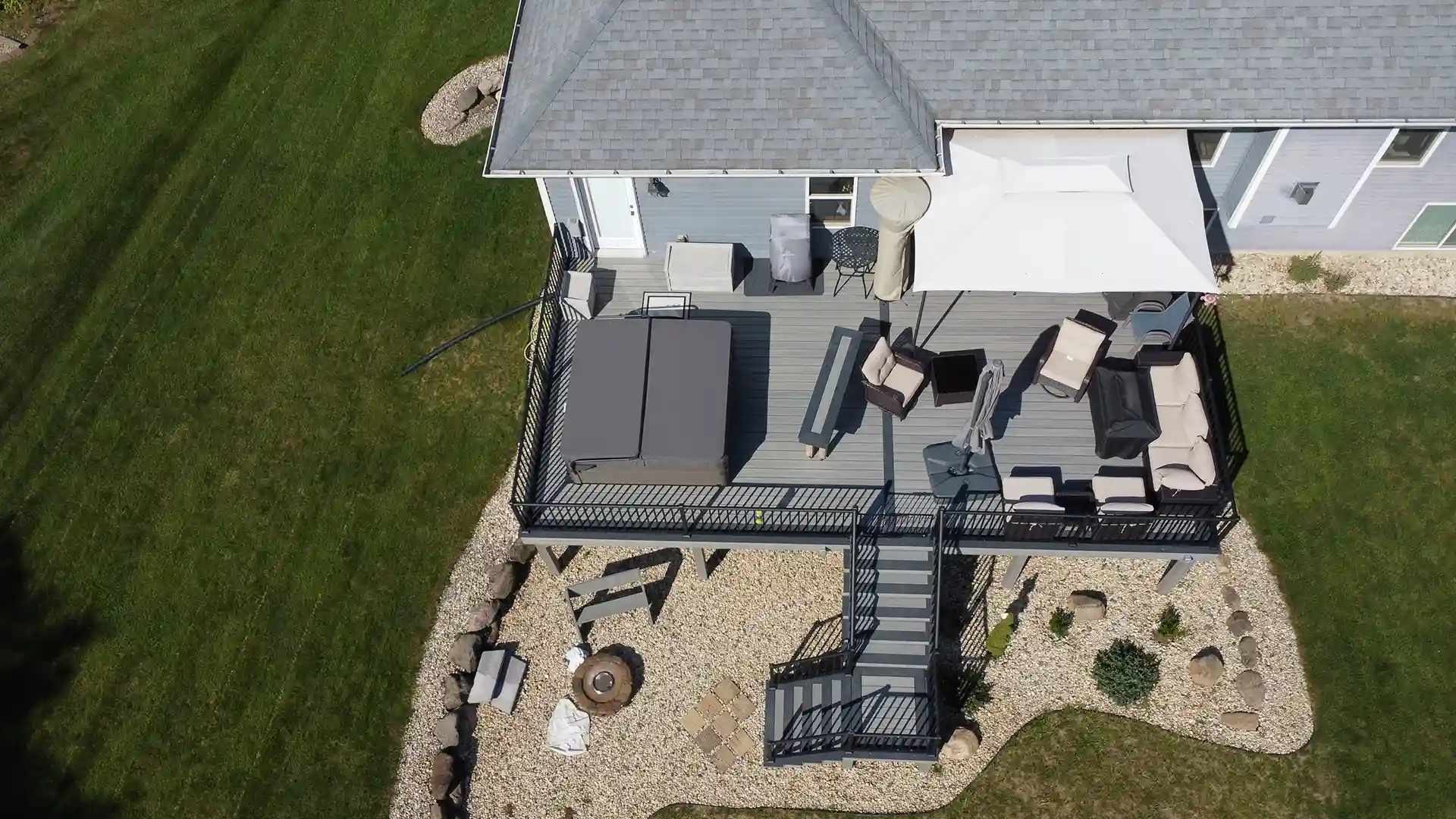 outdoor living space ideas Aerial view of a deck by 24x7 Deck Builders, a deck builder in Madison that provides outdoor living space ideas.